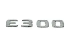 Genuine Mercedes 1248175715 Emblem; 300E/E300 Trunk Emblem - Mercedes | 1248171615 1248172315 1248172415 W01331829531